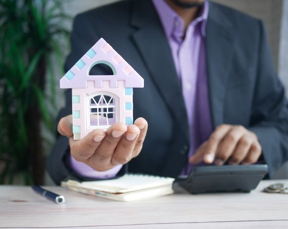 Indian property owner reviewing loan against property financing